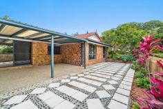  14 Silkwood Terrace Tweed Heads West NSW 2485 Situated in one of Tweed Heads West's finest cul-de-sacs, this beautifully positioned family home is set high on a corner block and offers generous single level interiors that seamlessly flow to the desirable sunny North facing patio, ideal for entertaining year round. Step into a spacious abode that effortlessly caters to the modern, growing family with a penchant for stylish living and the opportunity to add personal touches. This deceivingly large home is a sanctuary designed for comfort and entertainment, presenting a grand formal lounge and dining area that warmly greets visitors, setting the tone for the rest of the residence. The perfectly positioned kitchen is complete with a wall mounted oven, dishwasher and microwave cavity looking on to the North facing courtyard, an exquisite space that invites the gentle climate in. After a long day, retreat to the spacious air-conditioned master suite complete with walk-in wardrobe and generous ensuite including a luxurious deep relaxing bath. Four additional well-appointed bedrooms ensure that each family member has their own private space, while a separate area dedicated to children's activities keeps the household harmonious and organised. Freshly painted walls and plush, new carpet throughout provide a canvas ready for your personal touch. Practicality is not forgotten, with two garden sheds and a large remote-controlled double garage offering ample storage and security. This is an opportunity for family's, investors or developers to secure an ideal opportunity in a coveted location. 