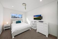  357 Marion Street Georges Hall NSW 2198 $1,599,950 Offering an impressive blend of size, comfort and quality finishes, this near-new duplex is a rare find set on over 400m2 with a flexible layout ideal for modern family living. Boasting five generous bedrooms, all with built-in wardrobes, plus a separate home office, this residence provides space for everyone. The master suite features a walk-in wardrobe, ensuite, ceiling fan and a private balcony with sweeping district views toward the Sutherland Shire. Living zones are thoughtfully spread across both levels. The open-plan kitchen, living and dining area flows effortlessly to the outdoor alfresco, while the upstairs living space is perfect as a kids' retreat or additional lounge. The kitchen impresses with 40mm stone benchtops, gas cooking and quality appliances. There are modern bathrooms on both levels, plus a separate laundry with an extra toilet and direct access to the yard. Outdoors, entertain in style under the covered alfresco with a built-in gas BBQ, burner and sink, overlooking the spacious backyard. Additional features include: Ducted air conditioning and ducted vacuum Security alarm and video intercom Combination of double brick and brick veneer construction Single lock-up garage plus separate driveway with off-street parking A premium opportunity offering space, flexibility and a rare land size - all in a quiet, family-friendly setting. 