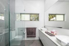 1A Tallean Road Nelson Bay NSW 2315 Built in 2022, this stunning near-new home presents an exceptional opportunity for those seeking a blend of modern luxury and location in the heart of Nelson Bay. In a convenient position, the home is an approx. 700m stroll from an array of shops, restaurants, and cafes. The home itself is crafted with quality materials, featuring a tasteful combination of brick and weatherboard that lends a timeless appeal. Privacy is thoughtfully considered, with the residence beautifully framed by a mature hedge and native plants, providing both natural greenery and an enhanced sense of seclusion whilst contributing to the established street presence. Step inside to discover an inviting open-plan layout where the living, kitchen, and dining areas flow seamlessly together. These spaces are flooded with natural light, enhanced by modern downlights, and complemented by ducted air conditioning. The kitchen is a true centrepiece of the home that caters perfectly to both everyday living and entertaining. From here, you can easily access the outdoor entertaining area, designed with minimal maintenance in mind and surrounded by lush greenery that ensures privacy for your relaxation and gatherings. The property accommodates three generously sized bedrooms, each thoughtfully designed to provide comfort and versatility. This makes the home ideally suited for retirees seeking a peaceful lifestyle, or anyone looking for the ultimate holiday retreat where tranquility meets convenience. Featuring: - Four bedrooms of accommodation plus study with carpeted flooring, ceiling fans and ducted air conditioning. The master suite has double sliding doors leading out onto a balcony - Open plan living, kitchen and dining space - Modern kitchen with quality appliances, including double oven, modern dishwasher and stainless steel sink - Outdoor covered entertaining area with minimal maintenance required - Electric awning on back deck - Luxaflex window blinds - 14 solar-hart panels providing energy efficiency - Oversized double lock up garage Location: - 450m stroll to bowling club - 650m stroll to golf club - 700m stroll to restaurants, cafes and specialty stores - 5 minute drive to Salamander Bay Shopping centre - 5 minute drive to Shoal Bay Beach With its contemporary features, prime location, and low-maintenance outdoor spaces, this residence promises a lifestyle of ease and luxury in one of Nelson Bay's most sought-after pockets. 