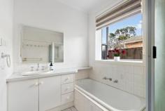  24B Armata Crescent Frankston North VIC 3200 $570,000 - $627,000 A cherished gem in a family-friendly pocket of Frankston North, this classic four-bedroom home exudes enduring potential with its immaculate garden surroundings and subtly updated interior. Light-letting and well loved, the home offers first-time buyers or investors the opportunity to embrace immediate comfort, all-while enjoying the convenience of local amenities. Recently updated floors and a fresh interior paint breathe life into a thoughtfully designed layout, where a central family bathroom services all four very spacious bedrooms. A dedicated lounge enjoys front garden-facing aspects and the comfort of a new split-system heating and cooling unit, while a dedicated meals area and kitchen comes complete with an upright oven/cooktop, a new dishwasher and plenty of bench space - set beneath an elegant bay window. Complementing a serviced-based rear yard, the landscaped frontage welcomes space for children to enjoy, coupled with a new driveway, with additional features comprising a seperate laundry, 2 year old gas ducted heating unit, ceiling fans, new air conditioner, new practical floors throughout, exterior window blinds and interior zebra blinds, a rear shed, water tank, energy saving hot water cylinder and a double carport with secure front gates. Set within less than 10 minutes to the beach or Seaford Train Station, easy reach of Mahogany Rise Daycare and Primary School, Aldercourt Primary School, choice in local reserves and playgrounds, and close proximity to bus stops. 