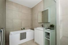  2A Summit Road Frankston VIC 3199 $720,000 - $792,000 Welcome to 2A Summit Road - a brand-new townhouse that perfectly balances luxury, functionality and low-maintenance living in one of Frankston's most convenient and fast-growing locations. Designed with quality and comfort in mind, this thoughtfully crafted home features 2 generous bedrooms both with private ensuites. The light-filled open plan living and dining area seamlessly connects to a private courtyard, creating the ideal setting for relaxed everyday living and effortless entertaining. At the heart of the home is a sleek designer kitchen with stone benchtops, premium appliances and excellent storage. The bathrooms are beautifully appointed with modern fixtures and floor-to-ceiling tiles, while additional features include a full laundry, ducted heating, split system cooling and a remote single garage. Ideally located just minutes from Frankston's vibrant CBD, the beach, Monash University, public transport and excellent local schools, this stunning residence offers the perfect opportunity for first home buyers, downsizers or investors alike. Move straight in and start enjoying the lifestyle you've been waiting for. 