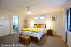  116 Sanctuary Crescent Pink Lake WA 6450 $1,118,000 Embrace the tranquility of lifestyle living just 13km from the heart of Esperance with this beautifully maintained 2.11-hectare property in sought-after The Sanctuary estate. Set amongst manicured grounds, the generous. modern rendered and insulated home offers: 4 spacious bedrooms, including a privately positioned master suite with walk-in robe and ensuite 2 bathrooms Central open plan living area incorporating dining, family and kitchen zones Well-equipped kitchen with walk-in pantry, ample bench space, electric cooktop, underbench oven and dishwasher Wood fireplace with Wetback system supporting the solar hot water system for energy efficiency Sun-filled entertaining patio perfect for relaxing or hosting Double carport plus freestanding caravan annexe for extra storage or guests Huge 13m x 12m shed with lined storage area and independent gas hot water system and bathroom. The fully reticulated block is serviced by a bore-fed 16,000L tank, complemented by a substantial 92,000L rainwater storage plumbed to the home. An ideal mix of space, privacy and comfort, this property offers a premium lifestyle opportunity within easy reach of town. 