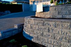  Retaining Wall Blocks Landscaping - Marion Landscape Construction Marion Landscape Construction specializes in producing retaining wall block solutions that are both fashionable and long-lasting. Their gardening expertise adds beauty and practicality to outdoor spaces by fusing strength and design. Marion's retaining walls are ideal for commercial projects, yards, and gardens because they provide solidity and give your landscape design a sleek, contemporary look. For more visit us! Visit us : https://marionlandscaping.com/services/retaining-walls/ 