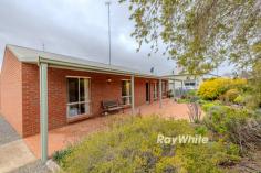  18 Poole Street Murrayville VIC 3512 $210,000 - $230,000 Offered to the market for the first time ever is this immaculate brick veneer three bedroom home built approximately 30 years ago. Featuring incredible cork flooring, evaporative cooling and split system heating/cooling. Central bathroom with shower, WC and toilet. Town water + rainwater tank connected to the house with pressure pump. Garage/shed with auto roller door with extra storage space. Established gardens plus fernery and several fruit trees. Large rear yard with enough room for additional shedding should you wish plus rear lane access, all situated on 1,010m2 (1/4 acre). Front & rear verandah, along with 12 solar panels. While you could give the property a splash of paint and some new carpet to update; the property is also extremely neat & tidy. Don't delay; as it could be another 30 years before this home comes available next. 