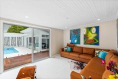  9 Ena St Terrigal NSW 2260 Occupying one of the most desirable lifestyle locations along Australia’s East Coast, this coastal-style home is a rare gem, combining luxury with dual living options and a blue-chip address just a 100m stroll to Terrigal Beach and Lagoon. Privately screened from the street, a remote security gate glides open to reveal a paved al fresco entertaining area with a captivating tropical ambience. A statement entryway to this magnificent property, enhanced by lush green landscaping, a tranquil water feature, a timber gazebo, and a dedicated dining area framing a striking chef’s kitchen, opens out to enjoy the outdoors via twin servery windows. Architecturally designed and custom built, an emphasis on inspired entertaining continues throughout, with expansive light-filled interiors presenting indulgent private quarters and multiple living zones before spilling out to a fantastic timber deck overlooking an in-ground saltwater swimming pool and adjoining pool house. Privately accessed, a dual-level, two-bedroom studio extends your accommodation options and artfully completes this exceptional package. Features include: – Coastal retreat occupying an exceptional beachside address within one of Australia’s most sought-after lifestyle locales. – Designed for effortless, low-maintenance living, this property offers a thoughtfully curated layout with easy-care finishes, durable materials, and minimal upkeep requirements, perfect for busy lifestyles, holiday rentals, or extended getaways. – 100 metre stroll to Terrigal beach and lagoon + just moments to Terrigal Esplanade with it’s diverse selection of trendy cafes, fine dining options, boutique stores, and vibrant nightlife. – Architecturally designed main residence spread across a sprawling single-level design, framed by magnificent al fresco entertaining zones on either side. – Inviting front entry, with a water feature, timber gazebo, and dedicated dining area wrapped around a striking chefs kitchen opening out via twin servery windows – all perfectly connected and welcoming you into the open-plan main living via stacked glass doors. – Double volume gourmet kitchen showcasing a sleek designer aesthetic accentuated by gleaming Caesarstone countertops, high-end stainless-steel appliances, and multiple breakfast bars opening out to the main internal and external living spaces. – Open-plan main family living and dining zone; a light-filled sanctuary with soaring high ceilings, a fresh contemporary colour palette, and neutral timber tones. – Master suite, complete with an ensuite bathroom and twin robes. – Three additional bedrooms (the second with its own ensuite bathroom), each with built-in robes. – Spacious second living room spilling out to the ultimate outdoor entertaining area, with an expansive timber deck offering space to sit back and relax while looking out across the heated in-ground swimming pool. – Dedicated pool house offering the perfect space for games and lounging (with a 4.5m movie screen!) or use as a yoga, pilates, or art studio, depending on your preferences. – Separate dual-level studio, privately accessed, and offering extended accommodation with two spacious bedrooms, a bathroom, a lounge, and a kitchen. – Secure off-street parking accessed via automatic gated entry, with triple car parking including one open car space and a tandem garage – all running the full length of the main residence and offering access out to the rear entertaining. – ‘Lock and leave’ capability perfectly enhanced by secure fencing around the full perimeter, a remote-controlled entry gate and garage door, a security system, and keypad entry between the main dwelling and studio. This is the perfect scenario for holiday rentals or extended vacation periods. – Council rates: $2,655 pa. (approx.) – Water rates: $317.52 pq. (approx.) 