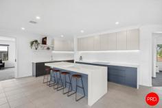  25 Blanchfield Drive Kyneton VIC 3444 $1,350,000 - $1,450,000 Set on a substantial allotment in a highly sought-after Kyneton location, this beautifully appointed residence delivers the perfect combination of modern style, functional design, and a lifestyle that embraces both indoor comfort and outdoor space. From the moment you step inside, the wide entry and light-filled interiors create an immediate sense of space, setting the tone for what's to come. The heart of the home is undoubtedly the expansive open plan kitchen, dining and living zone - designed with connection and comfort in mind. The living area flows effortlessly to the alfresco space, inviting year-round entertaining or easygoing afternoons with a good book and a glass of something local. The kitchen itself is a standout. At its centre, a generous stone-topped island offers the perfect perch for casual conversations or morning coffee rituals. Home cooks and entertainers alike will appreciate the quality appliances, plumbed fridge/freezer, soft-close cabinetry and abundant storage - all crafted for ease and style. The thoughtful layout means everything is within easy reach, whether you're cooking up a family feast or plating nibbles for guests. It's a kitchen that makes everyday tasks feel just a little more special. A thoughtful floor plan offers multiple living zones, including a formal lounge at the front and a versatile rumpus room, ideal for a kids' retreat or games space. Accommodation comprises 4 generous bedrooms, including a master suite with walk-in robe and private ensuite, while the remaining bedrooms are serviced by a stylish family bathroom. A dedicated study nook provides the perfect work-from-home solution. Outdoors, the property truly shines. Expansive lawns provide endless space for children, pets, and recreational activities, while the fire pit area offers a welcoming spot to gather on cooler evenings. The double garage, side access, and ample space for caravans or trailers further enhance practicality. Designed with modern efficiency in mind. Connected to town water, it features a powerful 33kW solar system complemented by three-phase power, ensuring reliable energy for the home and any additional needs. The all electric residence includes thoughtful upgrades such as electric ducted heating/cooling, induction cooking, a heat pump hot water system and energy-smart design that reduces running costs while maximising comfort. Located in a family-friendly pocket, just minutes from Kyneton's vibrant town centre, schools, parks, and V/Line services, this is a rare opportunity to secure a modern home on a large block without compromising on convenience. Key Features: • Four bedrooms plus study, two bathrooms, multiple living zones • Stylish kitchen with stone benchtops, large island, and walk-in pantry • Covered alfresco and fire pit entertaining area • Expansive block with side access, ideal for caravans, trailers, or sheds 