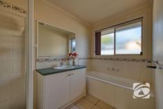 16 Acre Ct Pakenham VIC 3810 $650,000 - $700,000 The Perfect First Start Nestled in a quiet court location, this four-bedroom home offers comfort and convenience in a highly desirable area. Ideal for first home buyers and investors, it’s a property that ticks all the right boxes. The layout begins with a spacious master bedroom at the front, complete with a walk-in robe and private ensuite. The remaining three bedrooms are located further within the home, all featuring built-in robes and serviced by a central family bathroom and separate toilet. The generous light-filled living area flows seamlessly into the tiled open-plan kitchen and dining zone. The kitchen is fully equipped with a gas cooktop, oven, dishwasher, breakfast bar, and ample storage. Step outside and you’ll find a large decked entertaining area overlooking a well-established lawn, an ideal space for relaxing, entertaining, or letting the kids and pets enjoy the outdoors. 