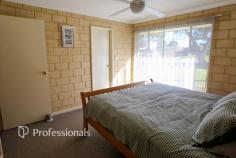  34 Westmacott Street Castletown WA 6450 Positioned just one street back from Castletown Quays, this solid double brick 3-bedroom home is ideal as an investment or starter property. The open plan layout features a functional kitchen, formal lounge, and timber look vinyl flooring throughout. Comfort is assured with ceiling fans in the living area & main bedroom and a tile fire for heating. Outside offers a carport under the main roof, a garden shed, 2 x established raised garden beds, auto reticulation, rainwater tank and an extensively paved driveway for low-maintenance living. 