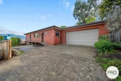  37 Begonia Street Lindisfarne TAS 7015 $640,000 - $680,000 Classic 1971 brick beauty with sweeping bird's-eye views of Mt Wellington, this home offers an inviting and practical layout ideal for a range of buyers. The open plan living area feels bright and welcoming, with a refreshed kitchen at its heart - perfect for everyday living and easy entertaining. From the lounge, step out to the private courtyard, a great spot for relaxed BBQs or afternoon catch-ups with friends. There are three comfortable bedrooms, along with a family-friendly bathroom featuring both a shower and a separate bath. Car storage is well catered for with a double garage featuring an automatic roller door, plus extra off-street parking for a second vehicle. At the top of the block, you'll find a bonus yard space with a chook pen and clothesline - ideal for those wanting a touch of self-sufficiency. Set on a 668sqm (approx.) block with a building size of 98sqm (approx.) plus a 36sqm (approx.) garage, this property is a fantastic opportunity for first home buyers or a builder keen to extend (STCA). 