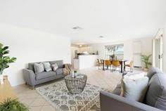  1A Culver Ave Sturt SA 5047 $795,000 to $845,000 In a wonderful location with no direct neighbours to the east, this contemporary 2002-built home is the perfect example of comfortable courtyard living. Three carpeted bedrooms begin with a beautiful front-positioned master capitalising on its northerly aspect with a bay window welcoming plenty of natural light, as well as a walk-in robe and ensuite bathroom. Bedrooms two and three are serviced by a central main bathroom with shower, inset bath and convenient separate toilet. A spacious tiled kitchen, living and dining space at the rear is open plan and airy, with big picture windows overlooking the backyard and a side courtyard space. A neutral U-shaped kitchen offers plenty of bench space, gas cooktop, raised breakfast bar and excellent storage, while sliding doors open onto a paved alfresco area perfect for entertaining outdoors. A securely fenced lawn backyard has ample room for little legs as well as scope for landscaping or adding a covered outside space. More to mention: - Built-in robes to bedroom 2 & study nook or storage provision to bedroom 3 - Ducted reverse cycle air conditioning throughout - Double lockup carport with drive-through & internal access + extra driveway parking - Excellent storage - Separate laundry with outside access Just minutes from the beach, Westfield Marion and Flinders University, with the bus, Flagstaff Hotel, local eateries and shops within walking distance and easy access to the CBD via the Southern Expressway, there's lots to love about the lifestyle this location has on offer. A superb investment, low maintenance live-in or affordable starter – this one will be popular, don't miss it. 