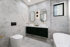  4A Paine Avenue Moorebank NSW 2170 This stunning custom-built residence showcases modern elegance, luxury finishes, and thoughtful design throughout. Perfectly combining comfort and sophistication, this home offers a lifestyle that is second to none. Property Features: Four generous bedrooms - Master with walk-in robe, ensuite featuring a double-head shower, and private balcony Convenient laundry chute in the main bedroom Custom joinery throughout, showcasing superior craftsmanship Separate media room, ideal for family movie nights or a private retreat Stylish kitchen with premium appliances, stone benchtops, and ample storage Elegant gas fireplace creates a warm and inviting atmosphere 26-panel solar power system for energy efficiency In-ground saltwater swimming pool Outdoor kitchen with built-in BBQ and bar fridge Half-court Basketball court and low-maintenance landscaped yard - perfect for family fun Security Camera & Alarm system This architecturally designed home is ideal for growing families who love entertaining in style. Located in one of Moorebank's most sought-after streets, this property is close to quality schools, shops, and transport. Features: Close To Schools Close To Shops Close To Transport 