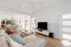  31 Tomaree Road Shoal Bay NSW 2315 Perfectly positioned in one of Shoal Bay's most sought after streets, this beautifully renovated coastal beach house seamlessly fuses classic charm with modern comfort and versatility. Showcasing oak floors and abundant period character, the expansive single level layout offers multiple living areas, including a generous open-plan kitchen, family, and dining space. Bathed in natural light, the interiors exude a breezy coastal ambience and welcoming warmth. Reflecting its idyllic surroundings, the home embraces a serene palette of timber, crisp whites, and ocean inspired blues, bringing the beach to your doorstep. A true standout feature is the rare addition of a separate studio accommodation, enhancing the property's appeal with added lifestyle flexibility or dual-income potential. With high ceilings, its own kitchen, and a stylish bathroom, the studio currently serves as a successful holiday rental. Approx. 300m from the pristine shores of Shoal Bay Beach, this property delivers the ultimate in laid-back coastal living. Featuring: Main Residence - Classic white weatherboard facade framed by manicured lawns and hedging - Spacious open-plan living, kitchen, and dining zones - Oak flooring, split system air conditioning, and ceiling fans throughout - Stylish kitchen with induction cooktop, ample storage, and treetop outlook - Covered outdoor entertaining area overlooking a fully fenced backyard - Three generously sized bedrooms filled with natural light Separate Studio Accommodation - Open-plan layout with modern kitchen and direct backyard access via sliding doors - Sleek contemporary bathroom - Ceiling fans and downlighting - Ideal for guest retreat, home office or income-producing holiday rental Location. Approximate distances. - 300m to Shoal Bay Beach and Shoal Bay Country Club - 2.5km to Little Beach - 5 minute drive to Nelson Bay CBD 