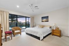  11 Crozet Court Burleigh Waters QLD 4220 $2,450,000 Set in one of Burleigh Waters' most exclusive cul-de-sacs, this stunning 940m² north-west facing residence commands an impressive 40 metres of serene water frontage, elevated over the breathtaking expanse of Pelican Lake. A true lifestyle estate, this masterfully designed home blends timeless sophistication with relaxed, resort-style living in the Gold Coast's most coveted enclave — Burleigh Cove. From the moment you enter, you're greeted with sweeping water views from all key living zones. Including the kitchen, dining, living, and the luxuriously appointed master suite. Indoor-outdoor flow is seamless, with multiple covered alfresco spaces tailored for entertaining and private retreats alike. A hardwood-decked gazebo sits gracefully beside the sparkling pool with frameless glass fencing, the perfect vantage point for golden sunsets over the lake. All this, just moments from patrolled Burleigh Beach, James Street's vibrant dining and shopping scene, local markets, elite schools, Bond University, and only 20 minutes to Gold Coast International Airport. Property Features: * Elevated 3.5m entry * 2.6m High ceilings throughout * Four generously sized bedrooms with built-in robes * Private master retreat with expansive lake views, walk-in robe, and spa ensuite * Family-sized kitchen with 900mm induction cooktop, large pantry & Stone Tops * Multiple alfresco entertaining zones + hardwood decked gazebo * Sublime resort-style pool & frameless glass fencing * Private pontoon and fully fenced yard on a wide 40m waterfront * Ducted air conditioning, ceiling fans, and underground gas lines * Spacious laundry with ample storage * 18 Solar panels 6.4K with battery storage * Double lock-up garage with workspace * Freshly painted exterior * Vacuum made * 250 Litres new Rheem hot water tank Burleigh Cove is evolving as one of the Gold Coast's most distinguished estates. 'Burleigh Cove' was created in 1998 with homes set to a very high standard and complimented with gorgeous, landscaped settings, parks and featuring splendid waterways with ocean fed Burleigh Lake. Located in a convenient central location, just a moments' walk to nearby parks, gorgeous Burleigh Lake & Stocklands Shopping Centre. On the afternoons that aren't spent in your backyard entertaining with family & friends, head up to the beloved 'James St' cosmopolitan and famous Burleigh Heads beach across the nearby footbridge. The buzzing heart of Burleigh is walking distance, just moments from your doorstep. The proximity to the famous Burleigh Beaches, renowned schools, "James Street" shopping precinct, boutique cafes, world class restaurants, bars and popular surf clubs is what gives this property the priceless sought-after lifestyle, presenting the Burleigh dream. This property is not just a house; it's a masterpiece waiting to be called home. Don't miss the opportunity to make this dream residence yours. 
