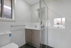  4/12A Angle Vale Road Evanston Gardens SA 5116 Welcome to 4, 12A Angle Vale Road, Evanston Gardens - a beautifully presented three-bedroom, two-bathroom home built in 2022. Tucked away on a quiet street, this contemporary residence combines smart design, quality finishes and low-maintenance living, making it an ideal choice for first home buyers, downsizers or investors. Set on an easy-care allotment of approximately 313m², the home makes a strong first impression with its clean, modern façade. Inside, floating floorboards flow from the hallway into the open-plan living areas, creating a cohesive and welcoming atmosphere. The spacious master suite offers a private retreat, complete with a stylish ensuite, generous walk-in robe and an abundance of natural light. Bedrooms two and three are well-proportioned and feature plush carpet along with built-in robes, providing both comfort and practicality. The central bathroom is sleek and neutral in its design and is paired with a separate toilet for added convenience. At the heart of the home, the open-plan kitchen, living, and dining area is bright and airy - the perfect space for everyday living or entertaining. The kitchen features stone benchtops, gas and electric cooking, a dishwasher and ample storage. From the living area, double sliding doors open to a private backyard with a paved entertaining space and a manageable lawn, ideal for weekend barbecues or simply relaxing with family and friends. Comfort is ensured year-round with reverse cycle heating and cooling, while the home also includes a well-sized laundry with external access, a rainwater tank, a smart video doorbell for added security and an automatic garage with internal access. Located close to local shops, quality schools, parks and public transport, this home delivers the perfect mix of peace and convenience. Opportunities like this don't come often - a modern, move-in-ready home with nothing left to do but enjoy. Whether you're starting out, slowing down or expanding your investment portfolio, this is a property that delivers on lifestyle, location and value. Make your next move today - arrange your inspection before it's gone! 