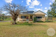  4117 Hume Highway Tarcutta NSW 2652 $779,000 Escape to the country and live the dream on this picturesque 10-acre hobby farm, just under 40 minutes from Wagga Wagga CBD and ideally positioned halfway between Sydney and Melbourne via the Hume Highway. This charming 3-bedroom brick cottage is full of rustic appeal and modern comfort, featuring a cozy wood fire for winter warmth and reverse cycle ducted heating and cooling to keep you comfortable all year round. The home has a robust solar system, making it perfect for eco-conscious living and reducing your ongoing costs. Outside, the property is set up for the serious hobby farmer or those looking for a peaceful, self-sufficient lifestyle. Enjoy established veggie gardens, a variety of fruit trees, and well-designed enclosures for goats, ducks, and chickens. There's ample room to expand your operation with fenced paddocks, machinery and hay sheds, and more. Whether you're looking to grow your own food, raise animals, or simply soak in the serenity of rural life, this property offers the perfect mix of lifestyle and location. Features: 3-bedroom brick cottage with wood fire & ducted reverse cycle heating and cooling 10 acres of usable land with fenced paddocks Veggie gardens & established fruit trees Separate animal enclosures/paddocks Large hay and machinery sheds Peaceful and private setting Less than 40 mins to Wagga Wagga Halfway between Sydney & Melbourne Your sustainable rural lifestyle starts here. 