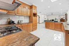  4 Livingstone Rise Lynbrook VIC 3975 $1,100,000 - $1,200,000 Every Child Gets Their Own Castle: Spacious Family Haven Discover the pinnacle of family living at 4 Livingston Rise, where this magnificent 40-square custom-built home sits in prestigious Lynbrook Heights, surrounded by pristine parklands on an exceptional 684 sqm (approx.) sanctuary. This is your family's gateway to Melbourne's most desirable family-focused community, where children thrive and parents enjoy unparalleled convenience. The thoughtfully designed residence welcomes you through an impressive foyer to the spacious master bedroom with bay window, walk-in robe, and private ensuite. The heart of the home flows seamlessly from generous family and dining areas into a fully enclosed alfresco space and expansive rumpus room, perfect for growing families. The gourmet kitchen, featuring granite benchtops, timber cabinetry, 900mm gas cooking, and walk-in pantry, becomes the natural gathering point, with a convenient second kitchen in the garage for effortless entertaining. Six generous bedrooms with built-in robes ensure everyone has their own personal retreat, complemented by family bathroom, powder room, and separate toilet. Year-round comfort comes through central heating, evaporative cooling, and quality window furnishings, while the double lock-up garage and garden shed provide practical storage. The location delivers true family magic. Lynbrook Heights positions you moments from excellent state and Catholic primary schools, with Lynbrook Shopping Centre's Coles, medical centre, and diverse dining just minutes away. Lynbrook Station provides seamless Melbourne CBD connectivity, creating perfect work-life balance. Children flourish with numerous parks, playgrounds, and the strong community spirit that makes neighbors lifelong friends. Ready to create your family's story? Don't let this opportunity pass by. Contact us today to arrange your private inspection and experience why Lynbrook Heights families never want to leave.  