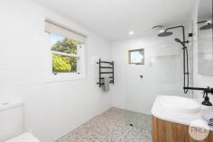  31 Tomaree Road Shoal Bay NSW 2315 Perfectly positioned in one of Shoal Bay's most sought after streets, this beautifully renovated coastal beach house seamlessly fuses classic charm with modern comfort and versatility. Showcasing oak floors and abundant period character, the expansive single level layout offers multiple living areas, including a generous open-plan kitchen, family, and dining space. Bathed in natural light, the interiors exude a breezy coastal ambience and welcoming warmth. Reflecting its idyllic surroundings, the home embraces a serene palette of timber, crisp whites, and ocean inspired blues, bringing the beach to your doorstep. A true standout feature is the rare addition of a separate studio accommodation, enhancing the property's appeal with added lifestyle flexibility or dual-income potential. With high ceilings, its own kitchen, and a stylish bathroom, the studio currently serves as a successful holiday rental. Approx. 300m from the pristine shores of Shoal Bay Beach, this property delivers the ultimate in laid-back coastal living. Featuring: Main Residence - Classic white weatherboard facade framed by manicured lawns and hedging - Spacious open-plan living, kitchen, and dining zones - Oak flooring, split system air conditioning, and ceiling fans throughout - Stylish kitchen with induction cooktop, ample storage, and treetop outlook - Covered outdoor entertaining area overlooking a fully fenced backyard - Three generously sized bedrooms filled with natural light Separate Studio Accommodation - Open-plan layout with modern kitchen and direct backyard access via sliding doors - Sleek contemporary bathroom - Ceiling fans and downlighting - Ideal for guest retreat, home office or income-producing holiday rental Location. Approximate distances. - 300m to Shoal Bay Beach and Shoal Bay Country Club - 2.5km to Little Beach - 5 minute drive to Nelson Bay CBD 