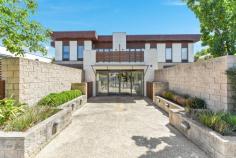  4/1311 Toorak Road Camberwell VIC 3124 $868,000 Nestled at the rear of a striking architectural development, this thoughtfully designed, low-maintenance three-bedroom town residence is bathed in natural light. Enhanced by double glazing for a 6-star energy rating and a peaceful ambiance, it offers a picturesque garden view with seamless access to an inviting outdoor courtyard through sliding patio doors. The open-plan living area features a designer kitchen with stone benchtops and premium Miele appliances, complemented by a convenient downstairs powder room. Upstairs, the generously sized bedrooms, including a master with ensuite, are fitted with built-in robes and are serviced by a stylish central bathroom. Additional highlights include video intercom, secure entry, polished timber floors, ducted heating and cooling, and a spacious double garage with remote control access. Located for ultimate convenience, this property is surrounded by transport options, shops, restaurants, a supermarket, and a medical center, all within walking distance. It is also close to parks, public and private schools, including Hartwell Primary, Wattle Park Primary, Deakin University, and Presbyterian Ladies College, just a short tram ride away. This exceptional residence is perfect for professional couples, investors, and downsizers seeking a low-maintenance lifestyle with access to premium amenities. 