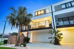  1 / 37 Twenty Seventh Avenue Palm Beach QLD 4221 $2,195,000 Set within a short stroll of popular beaches and the calm waters of Tallebudgera Creek, this architect-designed villa is one of four within boutique development 'The Palms'. Offering a laid-back, coastal lifestyle in the tightly-held northern part of Palm Beach, this tri-level home completed in 2021 is a flawless example of contemporary coastal design. Stone, VJ panels and earthy timber tones, elevate the fresh, breezy interior. Each floor hosts one of three bedrooms and bathrooms, with the master suite located on the top floor having an additional study or parents retreat. Natural light bathes the refined design, most notably through an elevated void to the open living, dining and kitchen area. filtering in through elegant glazed archways. Sliding doors open to a covered balcony, encouraging effortless indoor-outdoor entertaining and cross flow coastal breezes. Tucked away in a peaceful pocket of vibrant North Palm Beach, this viaal promises front-row access to a relaxed way of life centred around sun, sand and surf. The Highlights: - Architect-designed tri-level villa in Palm Beach - One of four residences making up boutique 'The Palms' development - Flawlessly completed by Alroe Constructions in 2021 - Contemporary coastal design with laminate timber, stone, arched glazing and VJ panelling - Open living, dining and kitchen area with balcony access - Living has 5.3m void; dining has arched glazing for natural light - Gourmet kitchen has stone island benchtop with breakfast bar, Bosch oven, integrated dishwasher and induction cooktop - One bedroom and bathroom on each level - Entire top-level master suite has walk-in robe, ensuite with his and her vanity, and private study or sitting area - Two additional bedrooms with built-in robes - All bathrooms have floor-to-ceiling tiles - Laundry has access to external drying court - Heated pool - Fully fenced, private yard - Ducted air conditioning throughout - Double garage Enjoy an amazing mix of lifestyle and location boasting a superb gourmet cafe precinct, hipster stores, restaurants and bars including Custard Canteen and Bantr. In PBC catchment and within close proximity are the Mallawa Sports Fields, revered local schools and 10 minutes Gold Coast International Airport. 