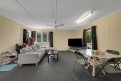  29 Coase Street West Gladstone QLD 4680 $450,000 This neat and tidy three bedroom home is perfectly positioned within walking distance to the popular Night Owl Shopping Centre and Gladstone Base Hospital. The ideal long term investment opportunity to add to your portfolio. The home is more spacious under roof than you would expect. The carpeted living/dining area is generous in size. The centrally positioned kitchen offers ample storage and bench preparation area. Three decent size bedrooms on offer. Family bathroom and separate toilet also tucked away down the hallway. The rear door from the kitchen leads to the sloping backyard. The laundry is underneath the home, PLUS gate access to underneath the home for storing your mowing and gardening tools. Snapshot: Neat three bedroom home, handy to West Gladstone amenities Spacious floorplan Large carpeted iving and dining space Three bedrooms - two with air-conditioning Family bathroom and separate toilet Single carport accommodation, plus space for extra vehicles Solar panels (5 Kw approx.) - save on the power bills Side access to the fenced rear yard 607m2 (approx.) 