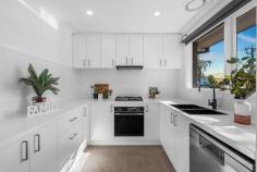  2/51 Watts Street Box Hill VIC 3128 $700,000-$770,000 Showcasing a full contemporary renovation, this stunning single-level residence delivers stylish, low-maintenance living in one of Box Hill's most tightly held locations. With its own street frontage and private driveway, 2/51 Watts Street feels more like a house than a unit - offering the ideal lifestyle for first home buyers, downsizers, or savvy investors. Step inside and be impressed by the generous open-plan living and dining zone filled with natural light and finished with beautiful timber-style flooring and neutral tones. The brand-new designer kitchen boasts stone benchtops, quality stainless steel appliances, and ample storage - ideal for both everyday use and entertaining. Two spacious bedrooms with built-in robes are serviced by a luxurious, fully renovated central bathroom featuring a walk-in shower, sleek tiling, and high-end fittings. Enjoy the convenience of a separate laundry and the comfort of split system heating and cooling. Outdoors, you'll find a low-maintenance courtyard perfect for relaxing or entertaining, while the rare double garage adds exceptional value and functionality. Best of all, this address is zoned for the highly sought-after Box Hill High School and Kerrimuir Primary, and is just moments from Box Hill Central, cafes, buses, trams, and parks. Key Features: Fully renovated throughout - just move in Own street frontage with private driveway Two spacious bedrooms with BIRs Designer kitchen with stone benchtops & quality appliances Stylish new bathroom & separate laundry Split system heating/cooling Low-maintenance courtyard Rare double garage Zoned for Box Hill High & Kerrimuir Primary 