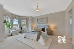  10 Pinnata Pl Narre Warren VIC 3805 $970,000 - $1,060,000 Where space meets style in prestigious Oatlands Set in the heart of the coveted Oatlands Estate, this outstanding family home showcases excellence in both comfort and design. Sprawling across a substantial 785 sqm corner block, this immaculately maintained residence presents an ideal haven for growing families who value space, sophistication, and modern convenience. The heart of the home features a large, functional kitchen equipped with quality gas appliances, abundant storage, and extensive bench space that flows effortlessly into three distinct living areas, formal lounge and dining rooms, plus a generous family and rumpus area, providing versatility for every lifestyle need. The luxurious master suite boasts walk-in robes and a spacious ensuite, complemented by three additional well-appointed bedrooms. Year-round comfort is assured with gas ducted heating and evaporative cooling, while timber floors create seamless flow throughout, with plush carpets in bedrooms and practical tiles in wet areas. The timber-decked covered patio extends your living space outdoors, perfect for entertaining against the backdrop of your private backyard. With excellent presentation and meticulous maintenance evident throughout, this property represents outstanding value in one of Narre Warren's most sought-after addresses. The location provides unparalleled convenience, offering everyday accessibility with Oatlands Primary School and Parkhill Plaza just a short walk away, while Westfield Fountain Gate shopping centre and direct Monash Freeway access ensure effortless connectivity for work and leisure. In this tightly held estate where quality homes rarely become available, this represents an exceptional opportunity to secure your family's future in a community that perfectly balances tranquil suburban living with modern convenience. 