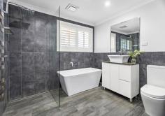  15 Armitage Avenue Horsley NSW 2530 A split level home in a sought after street presents here at 15 Armitage Avenue, Horsley. Perfect for a family looking to move in and enjoy the space, this is a fantastic opportunity to add your own touch and reap the rewards. The functional floorplan provides functionality and space, while the rear yard is a space that kids and pets will love and friends and family will want to be entertained. Located within walking distance to Dapto Public School and local shops and public transport and with doctors, Dapto Mall and freeway access nearby, this is the place to call home. Featuring • 4 bedrooms • Master with ensuite • Large living areas • Functional floorplan • Well appointed kitchen • Fully fenced rear yard • 3 car garaging • 600sqm block 
