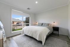  4/12A Angle Vale Road Evanston Gardens SA 5116 Welcome to 4, 12A Angle Vale Road, Evanston Gardens - a beautifully presented three-bedroom, two-bathroom home built in 2022. Tucked away on a quiet street, this contemporary residence combines smart design, quality finishes and low-maintenance living, making it an ideal choice for first home buyers, downsizers or investors. Set on an easy-care allotment of approximately 313m², the home makes a strong first impression with its clean, modern façade. Inside, floating floorboards flow from the hallway into the open-plan living areas, creating a cohesive and welcoming atmosphere. The spacious master suite offers a private retreat, complete with a stylish ensuite, generous walk-in robe and an abundance of natural light. Bedrooms two and three are well-proportioned and feature plush carpet along with built-in robes, providing both comfort and practicality. The central bathroom is sleek and neutral in its design and is paired with a separate toilet for added convenience. At the heart of the home, the open-plan kitchen, living, and dining area is bright and airy - the perfect space for everyday living or entertaining. The kitchen features stone benchtops, gas and electric cooking, a dishwasher and ample storage. From the living area, double sliding doors open to a private backyard with a paved entertaining space and a manageable lawn, ideal for weekend barbecues or simply relaxing with family and friends. Comfort is ensured year-round with reverse cycle heating and cooling, while the home also includes a well-sized laundry with external access, a rainwater tank, a smart video doorbell for added security and an automatic garage with internal access. Located close to local shops, quality schools, parks and public transport, this home delivers the perfect mix of peace and convenience. Opportunities like this don't come often - a modern, move-in-ready home with nothing left to do but enjoy. Whether you're starting out, slowing down or expanding your investment portfolio, this is a property that delivers on lifestyle, location and value. Make your next move today - arrange your inspection before it's gone! 