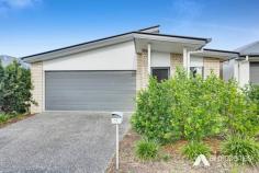  17 Breccia Street Yarrabilba QLD 4207 Welcome to this beautifully appointed residence, built in 2017 and thoughtfully designed to offer the perfect balance of modern style, everyday comfort, and functional living. Whether you’re searching for your dream family home or a smart addition to your investment portfolio, this home is sure to impress. From the moment you step inside, you’ll appreciate the well-planned layout and natural light that fills the home. A dedicated study nook at the front of the property provides a quiet space for working from home, studying, or managing daily tasks. At the heart of the home is a contemporary open-plan kitchen, complete with quality appliances, abundant cupboard space, and generous bench surfaces-ideal for any home cook or entertainer. Overlooking the air-conditioned living and dining area, this central hub flows effortlessly onto stylish timber-look flooring, enhancing the warm and inviting feel throughout the home. The home includes four well-proportioned bedrooms, providing space and privacy for the entire family. The master bedroom is a true retreat, offering a large built-in wardrobe, its own air conditioning, and a sleek ensuite. Each of the three additional bedrooms includes built-in wardrobes and ceiling fans, ensuring comfort in every room. The centrally located main bathroom is both practical and family-friendly, featuring a separate shower and bathtub. Step outside to a covered alfresco entertaining area-perfect for weekend barbecues or relaxed evenings with family and friends. The fully fenced backyard provides privacy and security, making it an ideal space for children and pets to play safely, while the double remote lock-up garage offers secure parking with convenient internal access. Adding to its appeal, the home is equipped with a solar power system, reducing ongoing energy costs and supporting sustainable living. Split system air conditioning in the main living area and master bedroom keeps the home comfortable year-round, while ceiling fans throughout provide additional airflow. Security screens are installed for peace of mind, and the landscaping has been designed with low maintenance in mind-perfect for busy families or investors. Located close to local schools, parks, shops, and public transport, this property offers the ideal combination of lifestyle and convenience in a growing, family-friendly neighbourhood. Offering a stylish, low-maintenance lifestyle and impressive modern features, this is a rare opportunity not to be missed. Property Features: • Year-round climate control provided by air conditioning. • Energy efficiency supported by a powerful 13kW solar system. • Contemporary kitchen appointed with a gas stove, stone benchtops, and a generous large pantry. • Light-filled open plan living and dining areas ideal for everyday living and entertaining. • Private master suite positioned at the rear, featuring a walk-in robe and a stylish ensuite. • Additional bedrooms fitted with built-in robes and suitable for children, guests or versatile use. • Family bathroom includes both a separate shower and bathtub to suit all ages. • Covered alfresco area equipped with ceiling fan and downlights, perfect for outdoor dining. • Double remote-control garage offering secure parking and direct access to the backyard. • Fully fenced yard providing privacy, safety, and room for pets or children to play. 