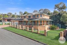  1A Darrell Road Tamworth NSW 2340 This large split-level brick home offers space, strength, and timeless charm in a quiet Calala street. With five bedrooms, four bathrooms, and a triple lock-up garage, there's room for the whole family and plenty of flexibility in how you live across a 540m2 floorplan. Downstairs features a spacious kitchen and dining area, one bedroom, two bathrooms, and a versatile room that could serve as a tiled home office or guest suite, complete with its own ensuite and internal access to the garage. Downstairs: 380m2 Upstairs are four more bedrooms and two additional bathrooms, making it ideal for large families or split living arrangements. The home still holds its original character, including floral carpets in excellent condition, with tiles downstairs and carpeted bedrooms throughout. Upstairs: 160m2 The quality and character of the home is evident throughout with widened hallways, doorways and space in the bedrooms including built in wardrobes. The master suite has exponential space with a grand, castle like interior with a spacious ensuite and walk in robe. Standing on a solid suspended slab, this large home offers the perfect opportunity to make it your own. Step outside to a full-length concrete verandah at the rear, perfect for entertaining or enjoying the peaceful outlook. There's also under-house storage adding to the practicality. Located in family-friendly Calala, close to schools, parks and shops, this solid, well-maintained home is ready to move into or update over time. Features: - Evaporative air-conditioning - Split level home - Triple lock up garage - Only 25 Years Old! - Opportunity to make your own Location: - Calala Inn Tavern - 3mins - IGA - 3mins - Butcher - 3mins - Dominoes Pizza - 3mins - Farrer Agricultural High School - 6mins - Carinya Christian School - 4mins - Tamworth CBD - 11mins 