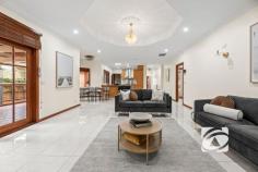  4 Livingstone Rise Lynbrook VIC 3975 $1,100,000 - $1,200,000 Every Child Gets Their Own Castle: Spacious Family Haven Discover the pinnacle of family living at 4 Livingston Rise, where this magnificent 40-square custom-built home sits in prestigious Lynbrook Heights, surrounded by pristine parklands on an exceptional 684 sqm (approx.) sanctuary. This is your family's gateway to Melbourne's most desirable family-focused community, where children thrive and parents enjoy unparalleled convenience. The thoughtfully designed residence welcomes you through an impressive foyer to the spacious master bedroom with bay window, walk-in robe, and private ensuite. The heart of the home flows seamlessly from generous family and dining areas into a fully enclosed alfresco space and expansive rumpus room, perfect for growing families. The gourmet kitchen, featuring granite benchtops, timber cabinetry, 900mm gas cooking, and walk-in pantry, becomes the natural gathering point, with a convenient second kitchen in the garage for effortless entertaining. Six generous bedrooms with built-in robes ensure everyone has their own personal retreat, complemented by family bathroom, powder room, and separate toilet. Year-round comfort comes through central heating, evaporative cooling, and quality window furnishings, while the double lock-up garage and garden shed provide practical storage. The location delivers true family magic. Lynbrook Heights positions you moments from excellent state and Catholic primary schools, with Lynbrook Shopping Centre's Coles, medical centre, and diverse dining just minutes away. Lynbrook Station provides seamless Melbourne CBD connectivity, creating perfect work-life balance. Children flourish with numerous parks, playgrounds, and the strong community spirit that makes neighbors lifelong friends. Ready to create your family's story? Don't let this opportunity pass by. Contact us today to arrange your private inspection and experience why Lynbrook Heights families never want to leave.  