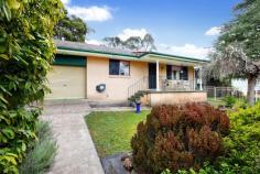  7 Kanimbla Valley Road Mount Victoria NSW 2786 $700,000 - $770,000 Nestled on an established garden block, this rendered brick home offers comfort, convenience and affordability. With 2 good proportioned bedrooms and a neatly appointed bathroom, this home is perfect for first-home buyers, down-sizers or investors alike. Step inside to discover an open plan living area that connects to the adjoining kitchen and dining room, creating a practical space for everyday living. The single garage with internal access adds to the home's functionality and security. Located within close proximity to local shops, schools, and parks, this home also enjoys the advantage of a direct train route to Sydney-making commuting a breeze. Don't miss this opportunity to secure a delightful home at the top of the Blue Mountains. 