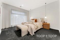  3B Bricknell St Magill SA 5072 $1,550,000 Welcome to 3B Bricknell Street, where elegance meets comfort in the heart of Magill. This exquisite 4-bedroom, 2.5-bathroom residence is a testament to refined living. Step inside to discover spaces crafted with unparalleled attention to detail. The open-plan living area is adorned with hardwood oak floorboards, exuding warmth and sophistication. Overhead, the ceiling-mounted S wave sheers allow soft light to cascade into every corner. The kitchen is a culinary dream, featuring a butler's pantry, an entertainer's oven, an extra-large sink, and a Vintec wine fridge, all complemented by sleek stone finishes. Step outside to the stunning al fresco area, perfect for gatherings, complete with a built-in Weber BBQ, sink, and alcove ready for a wine fridge. Upstairs, the master suite is a sanctuary of luxury, complete with a walk-in robe and an ensuite boasting dual sinks and terrazzo tiles—a true retreat. The additional bedrooms offer ample space and comfort, each thoughtfully designed for modern living. Other features include a Japanese-style automatic WC toilet with remote control, irrigation system, a gas fireplace in the living area, and ducted reverse cycle air conditioning with smart access for year-round comfort. The property’s strategic location in a super school zone, adjacent to a lush reserve, ensures convenience and tranquility. 3B Bricknell Street is more than a home; it’s a lifestyle. Experience the perfect blend of style, function, and location, making every day a special occasion. - 4 spacious bedrooms with ample storage - Terrazzo tiles in all bathrooms and laundry - Entertainer's kitchen with premium appliances - Al fresco dining with outdoor kitchen - Smart home features including CCTV and ducted AC 