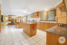  1A Darrell Road Tamworth NSW 2340 This large split-level brick home offers space, strength, and timeless charm in a quiet Calala street. With five bedrooms, four bathrooms, and a triple lock-up garage, there's room for the whole family and plenty of flexibility in how you live across a 540m2 floorplan. Downstairs features a spacious kitchen and dining area, one bedroom, two bathrooms, and a versatile room that could serve as a tiled home office or guest suite, complete with its own ensuite and internal access to the garage. Downstairs: 380m2 Upstairs are four more bedrooms and two additional bathrooms, making it ideal for large families or split living arrangements. The home still holds its original character, including floral carpets in excellent condition, with tiles downstairs and carpeted bedrooms throughout. Upstairs: 160m2 The quality and character of the home is evident throughout with widened hallways, doorways and space in the bedrooms including built in wardrobes. The master suite has exponential space with a grand, castle like interior with a spacious ensuite and walk in robe. Standing on a solid suspended slab, this large home offers the perfect opportunity to make it your own. Step outside to a full-length concrete verandah at the rear, perfect for entertaining or enjoying the peaceful outlook. There's also under-house storage adding to the practicality. Located in family-friendly Calala, close to schools, parks and shops, this solid, well-maintained home is ready to move into or update over time. Features: - Evaporative air-conditioning - Split level home - Triple lock up garage - Only 25 Years Old! - Opportunity to make your own Location: - Calala Inn Tavern - 3mins - IGA - 3mins - Butcher - 3mins - Dominoes Pizza - 3mins - Farrer Agricultural High School - 6mins - Carinya Christian School - 4mins - Tamworth CBD - 11mins 