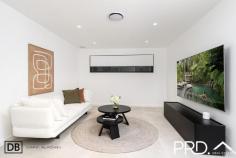 39 Victor Avenue Picnic Point NSW 2213 Positioned in one of the area's most prestigious addresses, this double-brick architectural triumph is a celebration of design, scale, and light. From the soaring void and sweeping staircase on arrival to the tranquil atrium with its sculptural feature olive tree, every element has been curated to evoke a sense of luxury and timeless elegance. Bathed in northern light and designed for grand entertaining, this is a residence of rare distinction. Property Flyover: - Double-brick construction with an architecturally striking façade, anchored by a sculptural Blackboy tree at the front. - Prestigious "Victor Avenue" address surrounded by premium homes. - Breathtaking entry with a dramatic void, grand staircase, and statement atrium featuring an established olive tree. - Expansive main lounge and dining area with open-plan design, soaring ceilings, feature fireplace, and remote-controlled curtains. - Multiple living zones, including formal and informal lounges - ideal for larger families. - Four high-end bathrooms appointed with premium fixtures and bespoke finishes. - Elegant curves and extensive banks of north-facing windows, flooding interiors with natural light and a sense of calm. - Five luxurious bedrooms, including a palatial master suite with a hotel-inspired ensuite and custom walk-in robe. - Showpiece stone kitchen with butler's pantry and expansive island bench - designed for effortless entertaining. - Enormous full-width alfresco with built-in kitchenette, overlooking a sparkling inground pool and manicured grounds. - Full outdoor bathroom for ultimate poolside luxury and convenience. - Ducted air-conditioning, CCTV, keyless entry, and smart home features. - Secure double garage with premium storage solutions, plus remote-operated front gate for further secure off-street parking. Sell Smarter ...ask a Local 