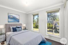 4 Nepean Way Tanilba Bay NSW 2319 Positioned in the heart of peaceful Tanilba Bay, this beautifully presented 4-bedroom home delivers the perfect balance of modern comfort, stylish design, and family-friendly living - all just 700 metres from the sparkling Tanilba waterfront. Step inside to discover a light-filled interior featuring a contemporary coastal colour palette that instantly creates a relaxed and inviting atmosphere. Designed for both functionality and lifestyle, the home offers spacious open-plan living with ceiling fans and split-system air-conditioning to keep you comfortable year-round. The well-appointed kitchen sits at the heart of the home, ideal for entertaining and everyday family life, while the seamless flow to the outdoor covered alfresco area makes dining and socialising effortless. Whether it's morning coffees or weekend barbecues, this space is perfect for enjoying the fully fenced backyard - ideal for kids, pets, or future additions like a pool. The master bedroom is a private retreat, complete with an ensuite and walk-in wardrobe. All additional bedrooms include built-in robes, ensuring plenty of storage space for the whole family. The home also features a double lock-up garage with internal access, providing added security and convenience. Set on a generous 620sqm block of land and located close to local schools, shops, and scenic walking trails, this is an exceptional opportunity to enjoy a relaxed coastal lifestyle with every amenity at your fingertips. 
