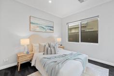  17 Gibraltar Way Mindarie WA 6030 THE ASSET Perfectly positioned in the stunning Catalina Beach Estate just moments from the shore, this elegant double-storey residence offers more than just a beautiful home—it delivers an enviable coastal lifestyle. Built by Ben Trager Homes, from the moment you step inside, there’s an effortless elegance that wraps you up. Think: timeless Hamptons-inspired details, soft coastal tones, dark hybrid floors underfoot, with a palette of crisp whites, natural textures, and sunlight streaming into every corner. Upstairs, the kitchen, dining, and living area is beautifully open and light-filled, with sweeping ocean views that steal the show. Picture entertaining friends and family as the sun sets over the water, and the kitchen’s generous scullery tucked neatly out of sight. It’s that perfect balance of coastal comfort and considered design. The master suite complete with a walk-in robe is also located upstairs offering a peaceful parent’s retreat. Downstairs, you’ll find a dedicated study, ideally positioned at the front of the home, perfect for those working remotely, three more spacious bedrooms with built-in robes, a family bathroom, separate toilet, laundry, and a bright activity space that flows out to the alfresco—ideal for multigenerational living. Your opportunity awaits to experience a home designed to elevate your everyday, effortlessly blending relaxed coastal living. Additional Features – 5KW Solar panels – Smart home WiFi system – In built speakers in the living area – Reverse cycle air-conditioning throughout – Fully reticulated gardens WHY MINDARIE? Mindarie offers an enviable coastal lifestyle. You’re just a short stroll to Mindarie Beach and on the weekends, a short drive will have you immersed in the vibrant Mindarie Marina, where you can enjoy waterfront dining, live music, and breathtaking sunsets over the Indian Ocean. Local amenities and Ocean Keys Shopping Centre are just a few minutes away. Families will love the proximity to local schools including Mindarie Primary School, Mindarie Senior College, and Peter Moyes Anglican Community School—all within easy reach, making the school run a breeze. This is the kind of location where community, convenience and coastal beauty come together—and once you’re here, it’s hard to imagine living anywhere else. 