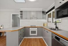  20 Chambers Street Latham ACT 2615 This beautifully updated three-bedroom home combines modern living with versatile outdoor spaces, making it perfect for entertaining. Featuring a newly revamped interior with fresh paint, floating wooden flooring, and carpet in the bedrooms, this home offers an ideal blend of quality, style, and easy-care living. Double-glazed windows, along with underfloor and ceiling insulation, provide energy efficiency year-round. Open-plan living areas flow seamlessly through Bi-fold doors on both sides to expansive covered entertaining areas. The front deck boasts an impressive, large flyover pergola, while the rear deck and pergola offer additional outdoor living space and overlook the low-maintenance, secure backyard. The stylish kitchen is perfect for both everyday living and entertaining, overlooking the sun-filled living areas that feature sleek, neutral décor throughout. Enjoy three spacious bedrooms, serviced by a functional family bathroom complete with a full-size bath and the convenience of a separate toilet. 20 Chambers Street showcases low-maintenance gardens, paved areas, and retained beds, thoughtfully designed to provide a practical, easy-care lifestyle. The fully secure rear yard is ideal for children and pets to play safely. Experience the perfect blend of comfort, style, and convenience in this prime location. It is just a short walk to Latham Primary School and St Francis Xavier College and only minutes from the Belconnen Town Centre. This home offers a peaceful, family-friendly neighborhood, with local amenities, schools, and public transport at your doorstep-everything you need is within easy reach. Now for sale and waiting for a new owner to enjoy the convenient location and all that this beautiful home has to offer! Features include: ? Updates internally with floating timber floors, new paint and carpet. ? Open plan living areas ? Three Generous Bedrooms ? Original bathroom and separate full-size laundry ? Three reverse-cycle air conditioning units for comfort all year round ? Front deck with a modern flyover pergola ? Large covered rear deck with ramp for accessibility ? Over 78sqm of covered outdoor entertaining, accessible through front and rear Bi-fold doors ? Two storage sheds ? Double carport + ample off-street parking 