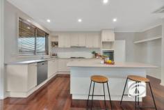  10 Pinnata Pl Narre Warren VIC 3805 $970,000 - $1,060,000 Where space meets style in prestigious Oatlands Set in the heart of the coveted Oatlands Estate, this outstanding family home showcases excellence in both comfort and design. Sprawling across a substantial 785 sqm corner block, this immaculately maintained residence presents an ideal haven for growing families who value space, sophistication, and modern convenience. The heart of the home features a large, functional kitchen equipped with quality gas appliances, abundant storage, and extensive bench space that flows effortlessly into three distinct living areas, formal lounge and dining rooms, plus a generous family and rumpus area, providing versatility for every lifestyle need. The luxurious master suite boasts walk-in robes and a spacious ensuite, complemented by three additional well-appointed bedrooms. Year-round comfort is assured with gas ducted heating and evaporative cooling, while timber floors create seamless flow throughout, with plush carpets in bedrooms and practical tiles in wet areas. The timber-decked covered patio extends your living space outdoors, perfect for entertaining against the backdrop of your private backyard. With excellent presentation and meticulous maintenance evident throughout, this property represents outstanding value in one of Narre Warren's most sought-after addresses. The location provides unparalleled convenience, offering everyday accessibility with Oatlands Primary School and Parkhill Plaza just a short walk away, while Westfield Fountain Gate shopping centre and direct Monash Freeway access ensure effortless connectivity for work and leisure. In this tightly held estate where quality homes rarely become available, this represents an exceptional opportunity to secure your family's future in a community that perfectly balances tranquil suburban living with modern convenience. 