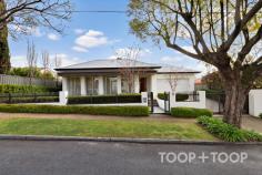  95 Church Terrace Walkerville SA 5081 Introducing a sensational custom designed sanctuary that ticks every box. With a highly prized position on the whisper quiet end of one of Walkerville’s most exclusive terraces, it boasts a sophisticated interior of effortless contemporary style that links indoor and outdoor spaces together with a north facing rear, manicured plantings and a sensational pool. With nothing left to do but move in, this is a truly exceptional chance to immerse yourself in one of Adelaide’s most prestigious and desirable city fringe locations ENTRANCE AND FORMAL LIVING Custom built to a high standard and completed in 2018, the house is gently elevated above the treelined street. A front lawn edged by clipped Japanese box and Crepe Myrtles frame the refined contemporary façade that incorporates a series of pillars punctuated by full length windows, a porch with a soaring timber door, and a remote entry double garage. Inside, superb timber floors stretch past a chic formal living space towards sundrenched open plan living. PRIMARY BEDROOM SUITE Privately situated, the generously proportioned primary suite has a dress circle position overlooking the front lawn through picture windows adorned with sheers and curtains. In addition to a walk-in robe, the stylish ensuite includes a separate WC and shower, double vanities, heated towel rails, and introduces striking black and white Moroccan style tiles that are mirrored in the laundry and main bathroom suite. FAMILY ACCOMMODATION A private wing includes two bedrooms both with built-in robes, and a third bedroom with built-in workspace that could be used as a study if desired. All share a 3-way bathroom suite with a separate WC and vanity. OPEN PLAN LIVING Drenched in north facing sunshine and warmed by an instant gas fire, open plan living is large and comfortable with zoned lounge, meals and kitchen overlooking the glorious rear grounds and pool. The kitchen is the star, with a host of integrated European appliances and a central island bench around which to gather and entertain friends. A large walk-in pantry provides oodles of storage and prep space. ALFRESCO LIVING AND POOL Linked to open plan living through sliders, alfresco living is something very special. Bathed in sunshine, undercover dining sits beside the pool and is equipped with an outdoor kitchen with Beefeater BBQ, gas wok ring, bar fridge and built in joinery. Soak up the sun beside the stunning heated pool with wide shallow steps on which to perch and enjoy the peaceful surrounds that comprise terraced lawns edged by Murraya and ornamental pears. FEATURES TO LOVE POOL • Solar heated • Salt filtration • Fully tiled & glass fenced • Sun lounge area PARKING • Remote gate entry • Double remote entry garage with secure internal access • Driveway with additional parking space APPLIANCES • De Dietrich oven & induction cooktop • Ilve oven • Dishwasher • Integrated Fridge/Freezer • Outdoor bar fridge • Beefeater BBQ & gas ring TECHNOLOGY & COMFORT • Instant Heat & Glo gas fire • R/C Air conditioning • Heated towel rail in primary suite • Quality window treatments • Pedestrian gate intercom • Remote entry sliding gate GARDEN • Automatic irrigation • Terraced lawns, hedging and ornamental trees LOCATION: Exclusive city-fringe less than 8km from Victoria Square SCHOOLS: Coveted zoning to Adelaide Botanic & Adelaide High Schools; Walkerville Primary School. Walk to Wilderness School & St Andrews. Close to PAC & St Peters College SHOPPING: Walkerville Terrace, Melbourne Street & O’Connell Street boutique shopping & cafes RECREATION: Walk to Walkerville Oval, Memorial Gardens & Bowling Club. Close to Linear Park & parklands 