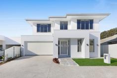  17 Suncove Court Burleigh Heads QLD 4220 $2,395,000 Welcome to this beautifully crafted, brand new two storey home in The Arbour, a premium family enclave in the heart of Burleigh Heads. Set on a generous 769 square metre block, this thoughtfully designed residence delivers effortless living, multiple living areas and a jet-equipped pool, all in a peaceful cul de sac location. A soaring void at the entrance sets the tone for the home's spacious layout, enhanced by high ceilings and a design guided by feng shui principles. Ducted heating and cooling ensure comfort year-round, while a 7 star energy rating reflects its efficiency. At the front of the home, a quiet study or home office offers the ideal work-from-home setup. A media or additional living space opens to the central hub of the home, where the kitchen, dining and living areas flow seamlessly to the outdoor alfresco and pool. The kitchen is a standout, with a striking 40mm stone waterfall island bench, soft-close drawers and a spacious butler's pantry. The backyard feels like a private retreat, with tropical landscaping surrounding the pool and alfresco area — perfect for entertaining or relaxing in complete privacy. The floor plan is ideal for large or growing families, with a fifth bedroom and ensuite downstairs. Upstairs, four more bedrooms include an oversized master retreat with dual walk-in robes, a private ensuite and uninterrupted views of the surrounding parklands. A large rumpus or second living zone on this level adds flexibility. Storage has been carefully considered, with understairs and linen cupboards throughout, plus an oversized laundry. The double lock-up garage features epoxy floors and space for additional storage, while side access and a fully usable yard complete the package. Set moments from local playgrounds, The Arbour offers a quiet lifestyle close to leading schools including Hillcrest, Kings, Marymount, Somerset and St Andrews. Stockland Burleigh, Burleigh Beach and Tallebudgera Creek are all just a short drive away. This is a rare opportunity to secure a brand new, move-in ready home in one of Burleigh Heads' most desirable new communities. 