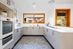  39 Hat Hill Road Blackheath NSW 2785 $865,000 - $895,000 Offering many of the hallmarks of an endearing mountain home, this warm and welcoming cottage has been sympathetically refreshed from top to toe. With fresh paint and brand new carpets throughout, updated bathrooms and a brand new ducted gas heater furnace, this is a home where you can walk straight in and feel immediately at home. Bathed in natural light, the home enjoys privacy to the fore and rear. Entering into the open plan living, dining and kitchen area, there are windows on all sides and a cosy slow combustion fire makes this a very comfortable setting. A sun dappled verandah faces north and is the perfect place to sit and enjoy relaxed downtime. Both bedrooms have their own bathrooms and an oversized laundry gives external access down to the under house area. A single garage, a third WC and an expansive creative space with full garden views and its very own slow combustion fire make this a very attractive addition. Those with a keen interest should add Gang Gang Cottage to the priority viewing list without delay. Breakdown of Features: Within a 900m stroll from village cafes, shops and amenities Freshly schemed throughout with neutral tones and new carpets Two queen bedrooms each with their own bathroom Ducted gas heating; s/c wood fire in open plan living area Covered north facing entertaining verandah with access from hallway and main bedroom Light-filled upgraded original kitchen with ample storage cabinets Spacious laundry with external access down to under house area Single garage with access to 3rd WC and expansive creative space Creative space with s/c fire and surrounding windows offering garden views Well established gardens with fruiting orchard 