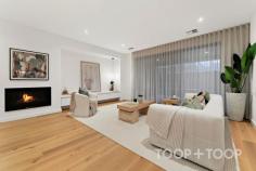  3B Bricknell St Magill SA 5072 $1,550,000 Welcome to 3B Bricknell Street, where elegance meets comfort in the heart of Magill. This exquisite 4-bedroom, 2.5-bathroom residence is a testament to refined living. Step inside to discover spaces crafted with unparalleled attention to detail. The open-plan living area is adorned with hardwood oak floorboards, exuding warmth and sophistication. Overhead, the ceiling-mounted S wave sheers allow soft light to cascade into every corner. The kitchen is a culinary dream, featuring a butler's pantry, an entertainer's oven, an extra-large sink, and a Vintec wine fridge, all complemented by sleek stone finishes. Step outside to the stunning al fresco area, perfect for gatherings, complete with a built-in Weber BBQ, sink, and alcove ready for a wine fridge. Upstairs, the master suite is a sanctuary of luxury, complete with a walk-in robe and an ensuite boasting dual sinks and terrazzo tiles—a true retreat. The additional bedrooms offer ample space and comfort, each thoughtfully designed for modern living. Other features include a Japanese-style automatic WC toilet with remote control, irrigation system, a gas fireplace in the living area, and ducted reverse cycle air conditioning with smart access for year-round comfort. The property’s strategic location in a super school zone, adjacent to a lush reserve, ensures convenience and tranquility. 3B Bricknell Street is more than a home; it’s a lifestyle. Experience the perfect blend of style, function, and location, making every day a special occasion. - 4 spacious bedrooms with ample storage - Terrazzo tiles in all bathrooms and laundry - Entertainer's kitchen with premium appliances - Al fresco dining with outdoor kitchen - Smart home features including CCTV and ducted AC 