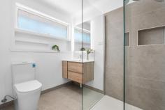  2/51 Watts Street Box Hill VIC 3128 $700,000-$770,000 Showcasing a full contemporary renovation, this stunning single-level residence delivers stylish, low-maintenance living in one of Box Hill's most tightly held locations. With its own street frontage and private driveway, 2/51 Watts Street feels more like a house than a unit - offering the ideal lifestyle for first home buyers, downsizers, or savvy investors. Step inside and be impressed by the generous open-plan living and dining zone filled with natural light and finished with beautiful timber-style flooring and neutral tones. The brand-new designer kitchen boasts stone benchtops, quality stainless steel appliances, and ample storage - ideal for both everyday use and entertaining. Two spacious bedrooms with built-in robes are serviced by a luxurious, fully renovated central bathroom featuring a walk-in shower, sleek tiling, and high-end fittings. Enjoy the convenience of a separate laundry and the comfort of split system heating and cooling. Outdoors, you'll find a low-maintenance courtyard perfect for relaxing or entertaining, while the rare double garage adds exceptional value and functionality. Best of all, this address is zoned for the highly sought-after Box Hill High School and Kerrimuir Primary, and is just moments from Box Hill Central, cafes, buses, trams, and parks. Key Features: Fully renovated throughout - just move in Own street frontage with private driveway Two spacious bedrooms with BIRs Designer kitchen with stone benchtops & quality appliances Stylish new bathroom & separate laundry Split system heating/cooling Low-maintenance courtyard Rare double garage Zoned for Box Hill High & Kerrimuir Primary 