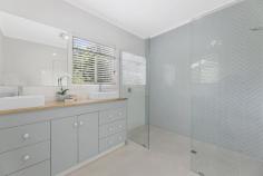  68 Rusty Court Tallebudgera valley QLD 4228 $3,350,000 Perched on top of a hill in sought after Tallebudgera Valley, landscaped for maximum privacy, this 4.5 acre low maintenance estate has stunning views of the hinterland and an abundance of wildlife. Room to gather together or find your own space in this impressive 668m2 single level dual living property. Perfect for multiple generations or extra income from the second three-bedroom residence. The main residence is a spacious modern 5 bedroom open plan home with multiple living areas, oak timber flooring and a rear alfresco entertainment zone with built-in barbeque and pizza oven overlooking the resort style pool. Whilst watching the kids in the pool cook up a storm in the contemporary kitchen with stone benchtops, integrated refrigeration and new stainless steel appliances. The servery creates direct contact with the alfresco area and the butlers pantry adds plenty of storage whilst giving you room to hide the mess behind the broadline glass doors. Escape to the master retreat, surrounded by lush tropical plantings, a luxe ensuite with double shower, walk in robe and two completely private decks. One of which leads past a pond and fountain to an outdoor pavilion hosting a spa, traditional Finnish sauna and shower. At the other end of the main house the children can enjoy their own oversized retreat that leads directly to the fully fenced yard, raised veggie patches and room for the pets, be it chickens, ducks or dogs. Two other bathrooms service the home. The main with a deep soak bathtub, double vanity, and shower. The other, directly opposite the large family laundry, is a three-way design with separate toilet, separate double vanity and another room containing the shower and bath for those busy mornings. Crossing the underroof double carport, we reach the second residence that consists of 3 bedrooms, separate toilet, bath, laundry and an open plan living area that leads to an outdoor entertainment pergola. New stainless steel appliances and timber benchtops grace the wrap around kitchen that has a plethora of storage and hinterland views. Storage abounds on this property inside and out with a double garage on the top level. Follow the driveway down to a two storey barn style shed with an upstairs studio and deck surrounded by foliage and private valley views. Your choice, an amazing property, lifestyle or investment. Approx. 12 minutes from acclaimed schools, this property also provides remarkable accessibility, being just 15 minutes from all of life's necessary conveniences and amenities and 20 minutes from beautiful Gold Coast beaches. See for yourself why this is a lifestyle to love, with all you need to prosper. Arrange your inspection today. Main House Features 4.5 acres of blissful and lush Tallebudgera Valley greenery Contemporary kitchen with thick stone benchtops, induction cooktop with stainless steel euro appliances (inc. self-cleaning oven, downdraft rangehood, instant hot water tap, built-in fridge/freezer, dishwasher and garbage disposal) Large butler's pantry with a surplus of storage Informal lounge room with fireplace Family living area leading out to separate alfresco area Dining room leading to sheltered outdoor entertaining area and pool Kids retreat with access outside Oversized master bedroom with walk-in robe, modern ensuite with dual showers, courtyard and private deck with pond and water fountain, leading to spa and sauna Bedroom 2, 3, 4 and 5 with fan and built-in robe Modern main bathroom with deep soak bathtub, shower, toilet, and double vanity Third bathroom with three-way design, separating vanity, bathroom and toilet Study/third living area Large laundry Alfresco entertaining area with fan, built-in BBQ and wood-fired pizza oven Resort-style pool with deck overlooking lush forestry Fire pit area overlooking hinterland Two double car carports with plenty of driveway parking LED lighting and German engineered oak timber floors throughout Granny Flat Features Expansive living room leading out to an outdoor entertaining deck Wraparound kitchen with wooden benchtops and stainless-steel German appliances throughout Three bedrooms with built-in robes Bathroom with shower, bathtub, vanity and separate toilet Large laundry Other Features 6x7 metre double garage shed Private driveway to 12x7.5m mezzanine shed with deck (upstairs studio is fully lined and insulated) with plumbing and electricity hooked up 2 x 7,500-gallon tanks servicing house 1 x 5,000 gallon tank servicing shed 5kW solar system servicing main residence Yard fully fenced for pets Commercial Enviro cycle system Separate Electric hot water systems Veggie patch, mulberry, dragon fruit Main residence has internal switching wired for generator Separate phone lines and power connection for each house Location Approx. 11 minute drive to St. Andrews Lutheran College Approx. 12 minute drive to Tallebudgera State School and local shops Approx. 14 minute drive to access the M1 Approx. 15 minute drive to Stockland Burleigh Heads Shopping Centre Approx. 21 minute drive to Palm Beach Approx. 22 minute drive to Burleigh Heads Approx. 24 minute drive to Gold Coast Airport & Southern Cross University 